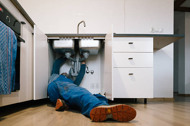 Professional Emergency Plumber technician working in Guthrie, KY